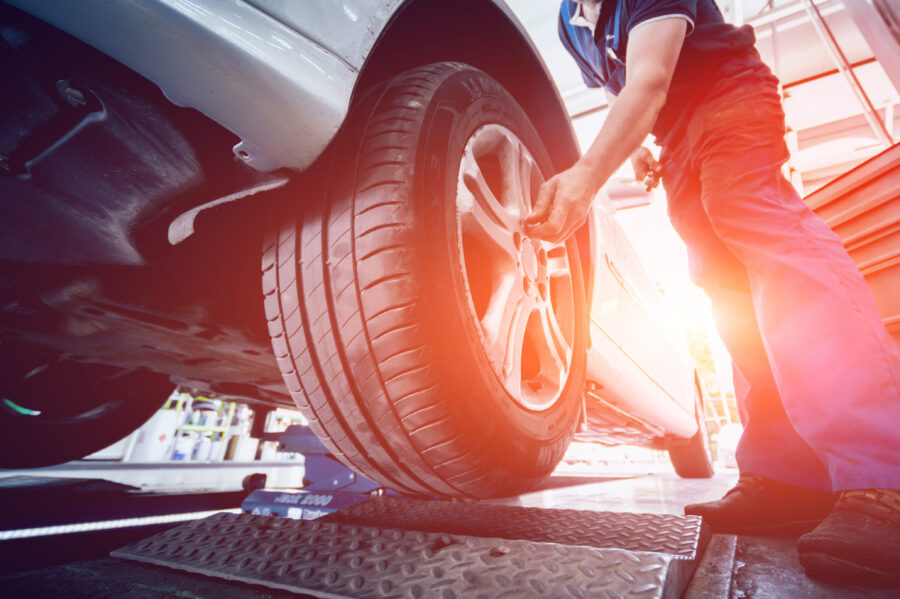Automotive suspension test and brake test rolls in a auto repair service.