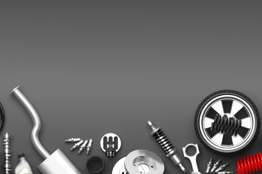 Various car parts and accessories on grey background. 3d illustration